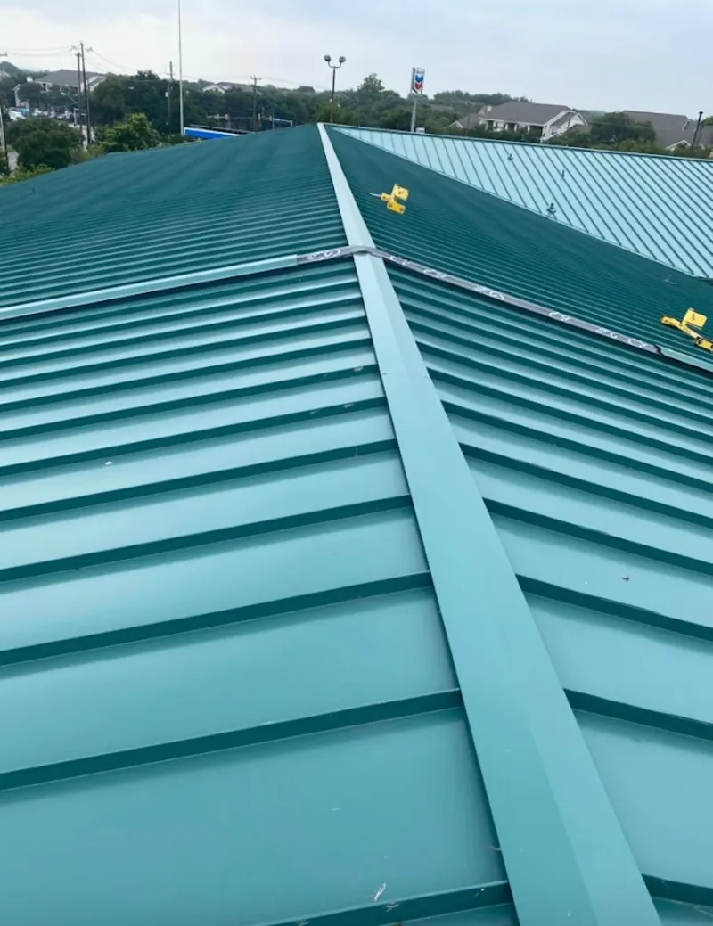 Green commercial metal roof ridge and valley for Metal Roof Repair in Orono
